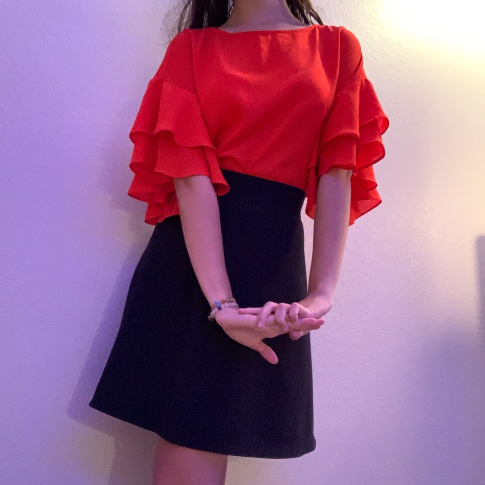 red flowy sleeve blouse